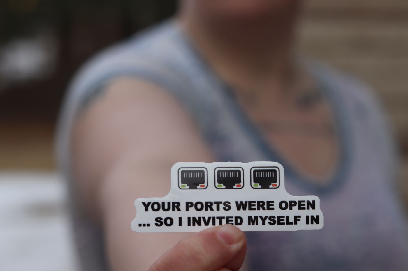 custom stickers in any shape — Person holding a funny internet security sticker about open ports