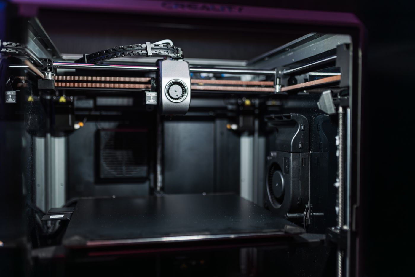 3d printer filament storage — Close-up view of a modern 3D printer interior showcasing advanced technology