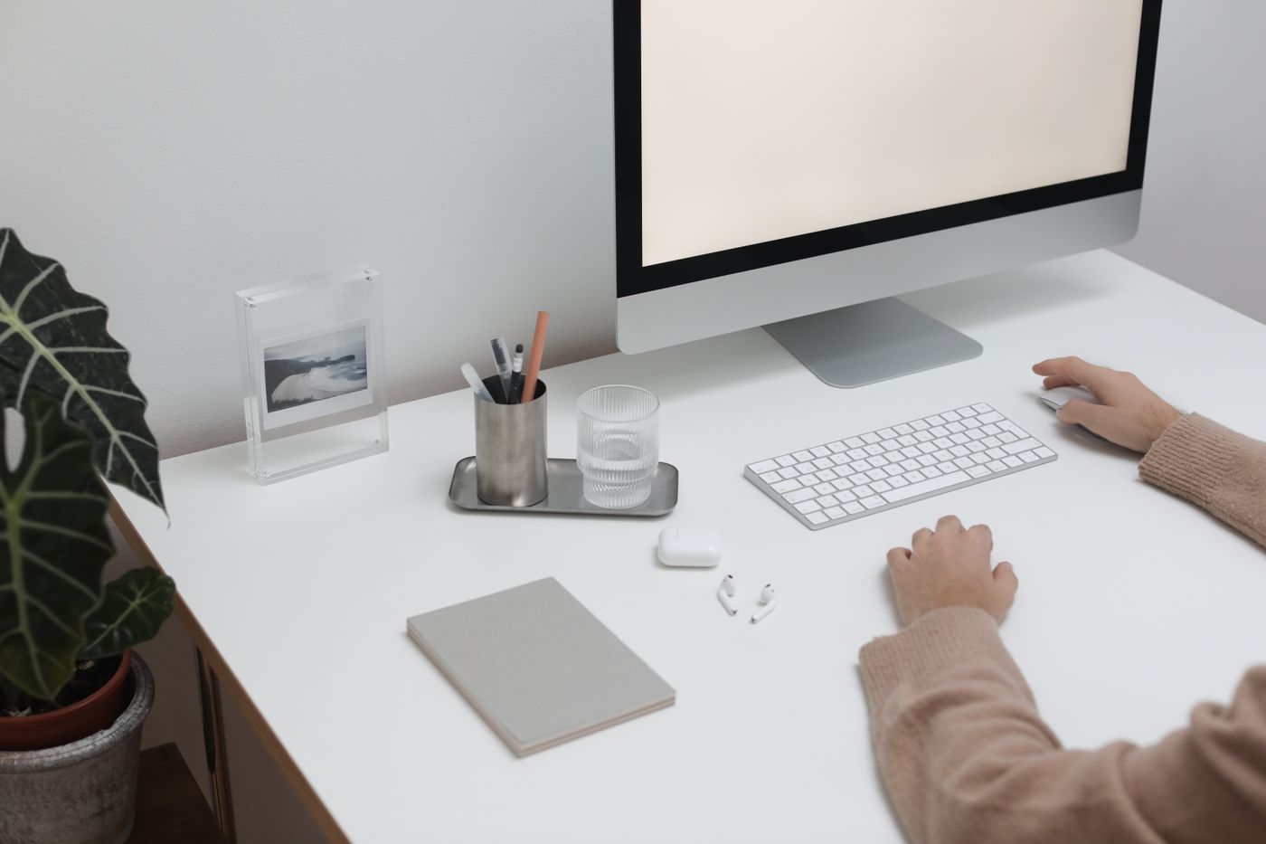 3d printed decorative box — High angle of crop faceless person sitting at table with wireless gadgets and computer