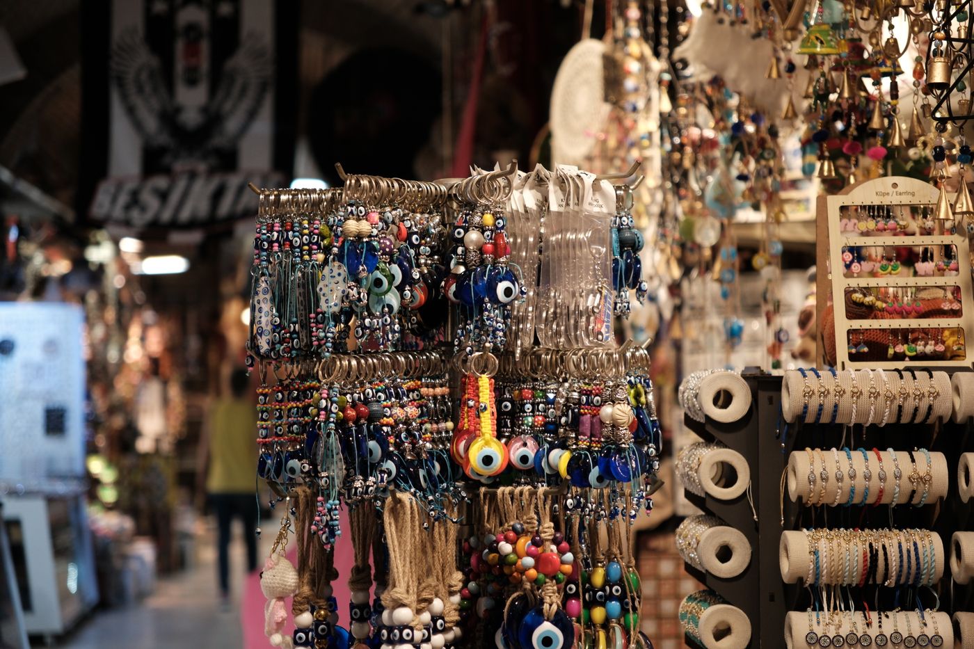 name keychain cricut — Vibrant display of traditional Turkish souvenirs in İzmir's bustling bazaar