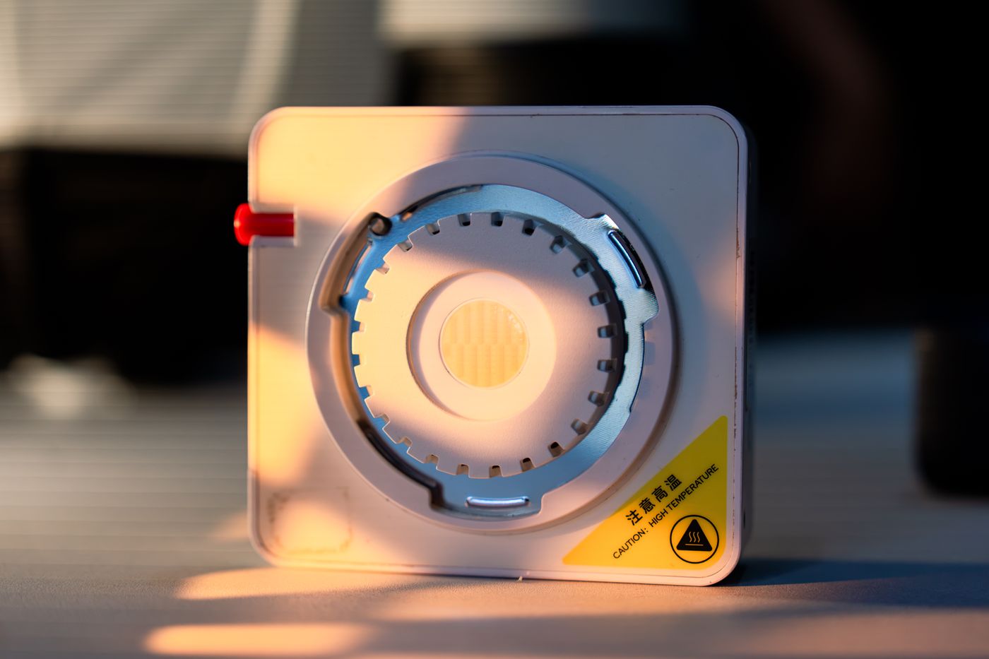 petg print settings — Detailed shot of industrial equipment showing a warning label about high temperature